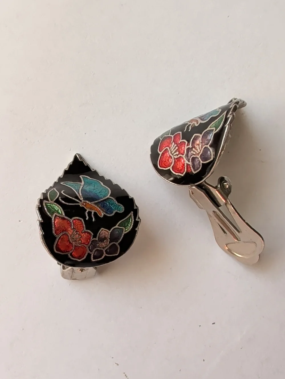 Enamel Floral Clip-On Earrings in Black with Red & Blue Accents
